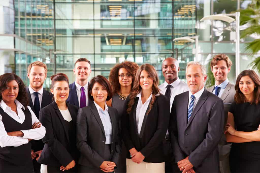 Group of business people standing in lobby