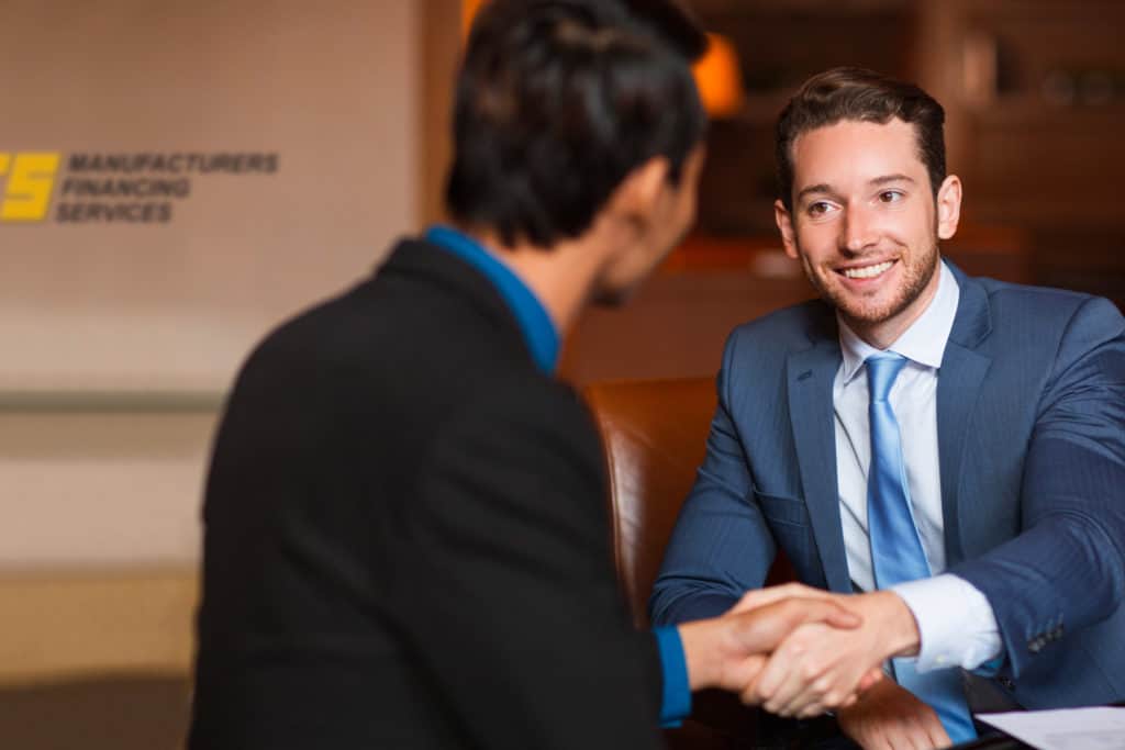 Two men shaking hands